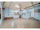 Spacious garage with shelving, storage and hanging racks at 1746 Stapleton St, Sarasota, FL 34239