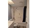 Bright bathroom featuring a shower-tub combination and modern fixtures at 2566 Forest Run Ct, Clearwater, FL 33761