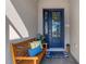 Charming entryway with a wooden bench, colorful pillows, and a 'Welcome' mat at 5035 Seafoam Trl, Bradenton, FL 34211