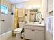 Bathroom featuring a vanity with cabinets and shower and tub combination at 5918 Palm Ln # C33, Bradenton, FL 34207