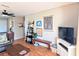 Bright open living area with laminate wood floor, decor, and a view into another room at 5918 Palm Ln # C33, Bradenton, FL 34207