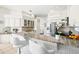 Kitchen bar with granite countertops, pendant lights, and stainless steel appliances at 7453 Featherstone Blvd, Sarasota, FL 34238