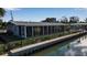 Beautiful waterfront home with a screened lanai and boat dock at 765 Saint Judes N Dr, Longboat Key, FL 34228