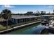 Beautiful waterfront home with a screened lanai and boat lift at 765 Saint Judes N Dr, Longboat Key, FL 34228