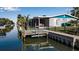 Beautiful waterfront home with a dock to easily access the canal at 765 Saint Judes N Dr, Longboat Key, FL 34228