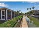 Lovely waterfront home with a screened lanai and canal views at 765 Saint Judes N Dr, Longboat Key, FL 34228