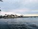 Beautiful waterfront views with palm trees and waterfront properties at 2350 Via Venice, Punta Gorda, FL 33950