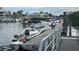 Waterfront view with a boat dock, boats and tiki hut dining at 2350 Via Venice, Punta Gorda, FL 33950