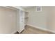 Walk-in closet featuring custom shelving and wood floor at 362 Pine Run Dr, Osprey, FL 34229