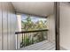 Outdoor patio with tropical foliage and blue sky at 362 Pine Run Dr, Osprey, FL 34229