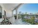 Enjoy city views from this condo balcony with seating, perfect for relaxing and entertaining at 505 S Orange Ave # 501, Sarasota, FL 34236