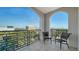 Spacious arched balcony with comfortable seating, offers a relaxing outdoor living space at 505 S Orange Ave # 501, Sarasota, FL 34236