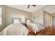Bedroom featuring hardwood floors, neutral walls, and two twin beds at 505 S Orange Ave # 501, Sarasota, FL 34236