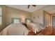 Bedroom featuring hardwood floors, neutral walls, and two twin beds at 505 S Orange Ave # 501, Sarasota, FL 34236