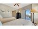 Cozy bedroom offers two twin beds, a dresser, and access to the outdoor balcony at 505 S Orange Ave # 501, Sarasota, FL 34236