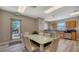 Modern community dining area with sleek furniture, an adjacent kitchenette and a view at 505 S Orange Ave # 501, Sarasota, FL 34236