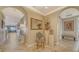 Inviting entryway featuring tile floors, arched doorways, and decorative accents with mirror at 505 S Orange Ave # 501, Sarasota, FL 34236