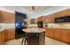 Beautiful kitchen boasts stainless steel appliances, and an island with barstool seating at 505 S Orange Ave # 501, Sarasota, FL 34236
