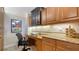Functional office space featuring a built-in desk, ample storage, and natural light at 505 S Orange Ave # 501, Sarasota, FL 34236