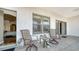 Cozy patio area with comfortable seating, ideal for outdoor relaxation and enjoying the fresh air at 505 S Orange Ave # 501, Sarasota, FL 34236