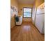 Pantry area and a kitchen cart for extra storage at 535 Spring Lakes Blvd, Bradenton, FL 34210