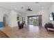 Open floor plan living room with sliding doors to the outdoor patio at 7518 Paspalum, Punta Gorda, FL 33955