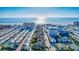 Stunning aerial view of a charming beach neighborhood with the ocean glistening in the background at 1185 Coquille St # 305, Sarasota, FL 34242