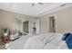 Spacious bedroom with a private outdoor patio and neutral tones at 12029 Perennial Pl, Lakewood Ranch, FL 34211