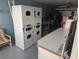 Community laundry room with several machines at 4509 10Th Street E Ct, Ellenton, FL 34222
