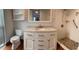 Bathroom with tile flooring, white vanity with marble countertop and a walk-in shower at 4900 38Th S Way # 201, St Petersburg, FL 33711