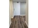 Inviting entryway featuring a clean white door and modern hardwood flooring at 4900 38Th S Way # 201, St Petersburg, FL 33711