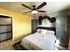 Bedroom featuring a ceiling fan and closet space at 5036 Barrington Cir # 2401, Sarasota, FL 34234