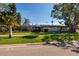 A lovely single-story home features a screened lanai and well-maintained landscaping at 5500 Bayou Grande Ne Blvd, St Petersburg, FL 33703