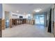 Kitchen area showing partial white cabinetry and tile flooring, offering potential for renovation and customization at 5500 Bayou Grande Ne Blvd, St Petersburg, FL 33703