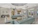 Elegant lounge area with upscale seating, modern décor, and neutral tones for a relaxing atmosphere at 6920 74Th Street E Cir, Bradenton, FL 34203