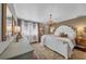 Main bedroom features neutral walls, hardwood flooring, and natural light at 7820 Seville Cir, Bradenton, FL 34209