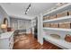 Office space with a work area, shelves, storage and a window for natural light at 7820 Seville Cir, Bradenton, FL 34209