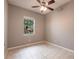 Bedroom with neutral paint, tile flooring and natural light at 2111 152Nd E Ct, Bradenton, FL 34212