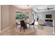 Inviting dining area with a view of the pool and enough space for seating and entertainment at 2111 152Nd E Ct, Bradenton, FL 34212