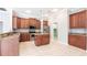 Well-equipped kitchen boasting stainless steel appliances, granite countertops, and ample cabinet space at 2111 152Nd E Ct, Bradenton, FL 34212