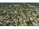 High-altitude aerial view of the neighborhood featuring numerous homes and tree-lined streets at 2302 8Th W Ave, Bradenton, FL 34205