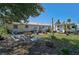 Outdoor space featuring a trailer, seating, and a large grassy area, perfect for outdoor activities at 2302 8Th W Ave, Bradenton, FL 34205