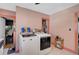Convenient laundry room with a modern washer and dryer set at 2302 8Th W Ave, Bradenton, FL 34205