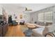 Bright living room featuring hardwood floors, a ceiling fan and a comfortable sectional sofa at 2302 8Th W Ave, Bradenton, FL 34205
