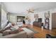 Bright living room featuring hardwood floors, a ceiling fan and a comfortable sectional sofa at 2302 8Th W Ave, Bradenton, FL 34205