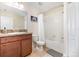 Bathroom featuring a vanity, toilet, bathtub with shower, and tile flooring at 2347 Richwood Pike Dr, Ruskin, FL 33570