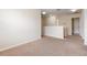 Upstairs landing with neutral carpet and access to multiple rooms at 2347 Richwood Pike Dr, Ruskin, FL 33570