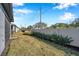 View of the fenced backyard of the home at 3747 Laughing Dove Ave, Sun City Center, FL 33573