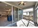 View from the screened patio into the home's living and dining areas at 3747 Laughing Dove Ave, Sun City Center, FL 33573