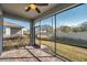Screened patio with brick flooring, providing a serene outdoor space at 3747 Laughing Dove Ave, Sun City Center, FL 33573
